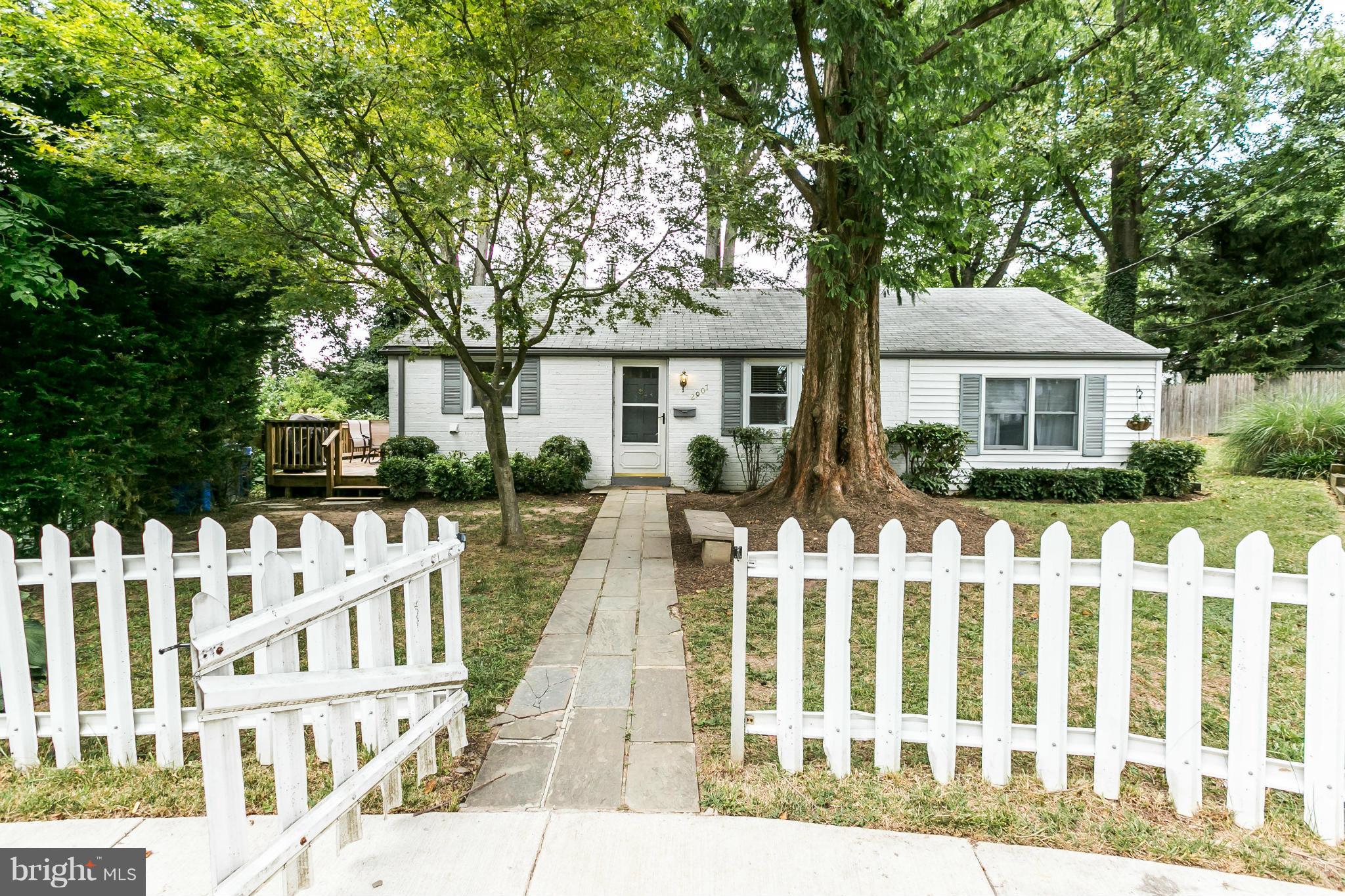 2907 Weisman Road Silver Spring, MD 20902 - Photo 29 of 30 a front view of white house with a yard