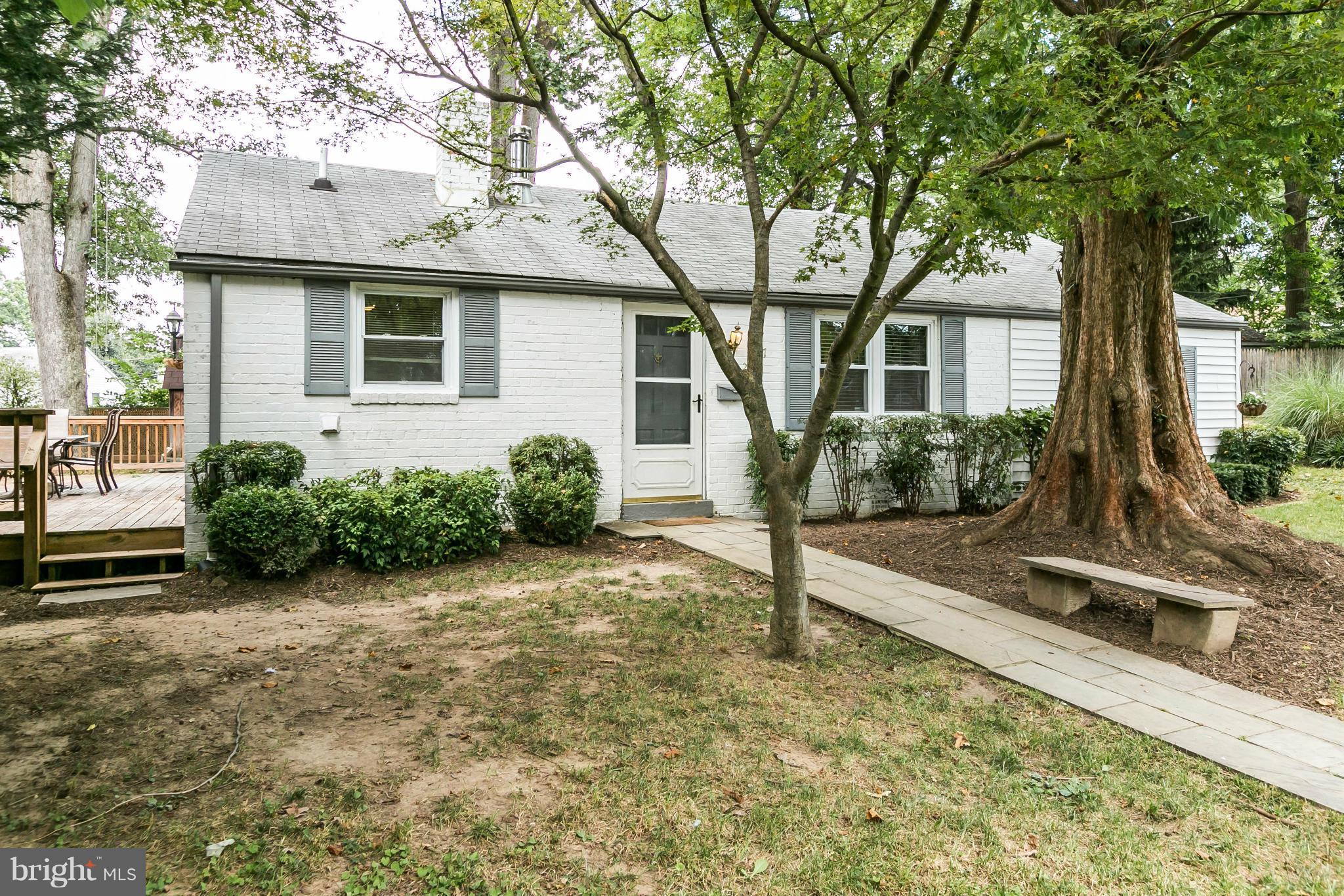2907 Weisman Road Silver Spring, MD 20902 - Photo 30 of 30 a view of a house with backyard and a tree