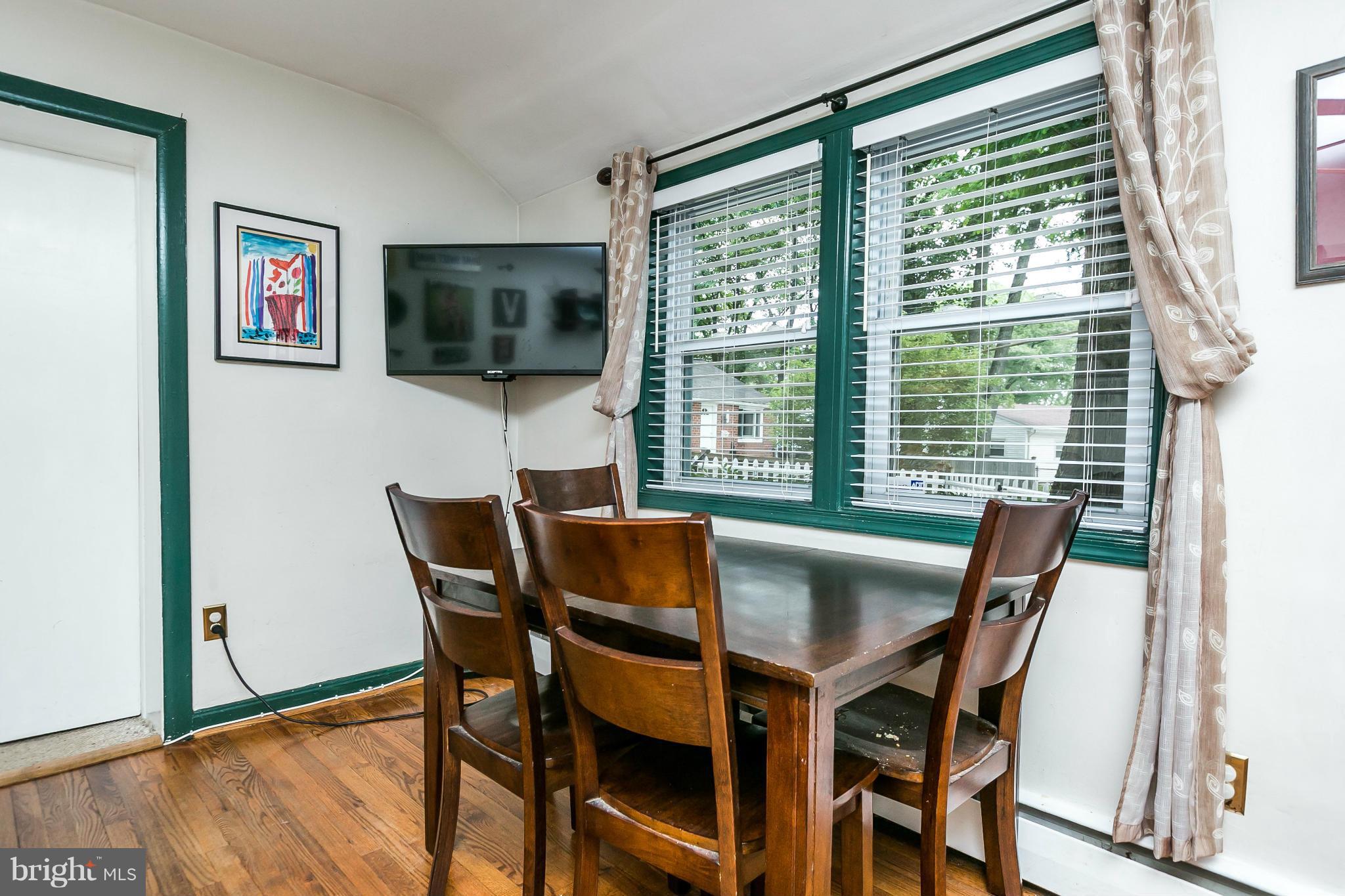 2907 Weisman Road Silver Spring, MD 20902 - Photo 5 of 30 a dining room with furniture and window