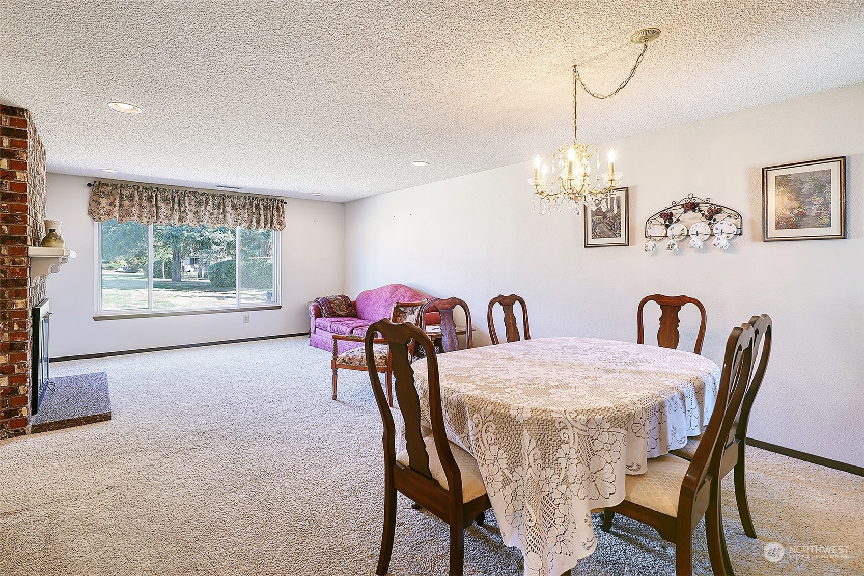 21509 4th Avenue West, Unit A21 Bothell, WA 98021 - Photo 2 of 17 a dining room with furniture and window