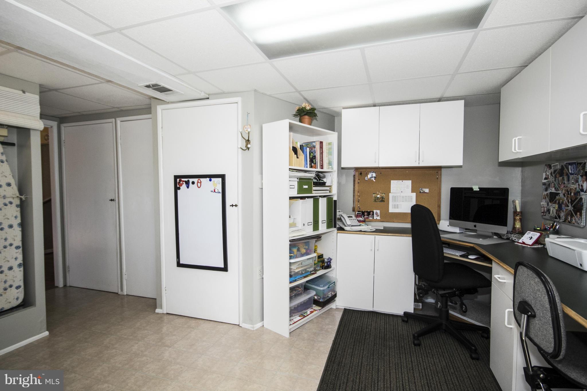 4715 East Joppa Road Nottingham, MD 21236 - Photo 22 of 30 a view of a workspace with furniture and a workspace