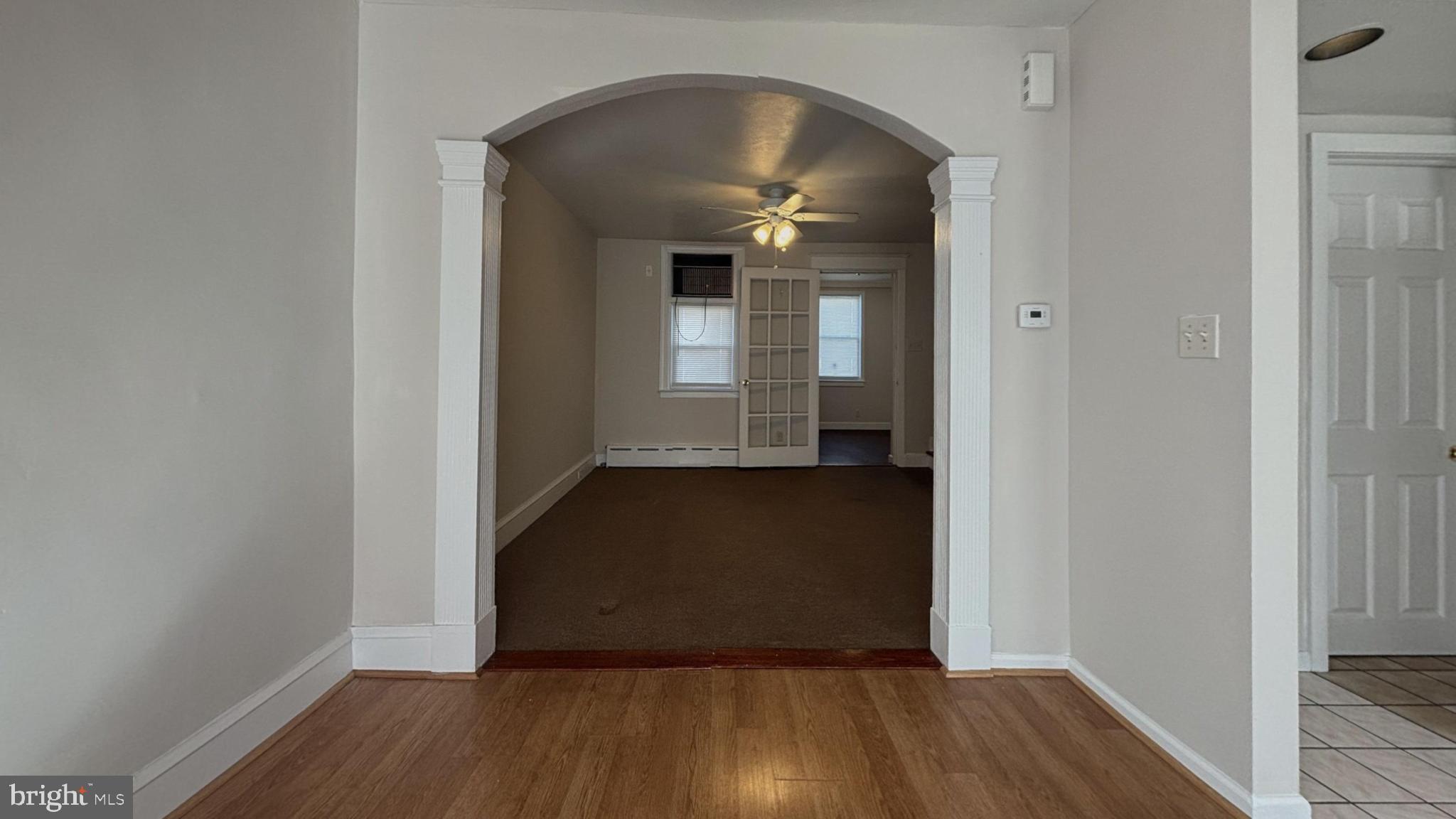 644 Littlecroft Road Upper Darby, PA 19082 - Photo 2 of 7 wooden floor in a hall with an entryway