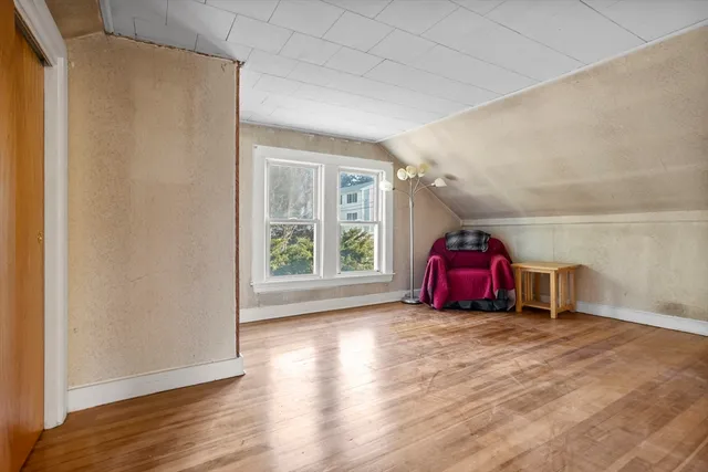 a view of a roof deck with wooden floor