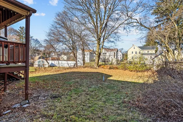 a view of a house with snow on the background