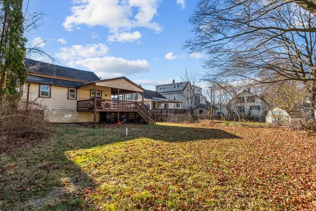a picture of a bench in front of a wall