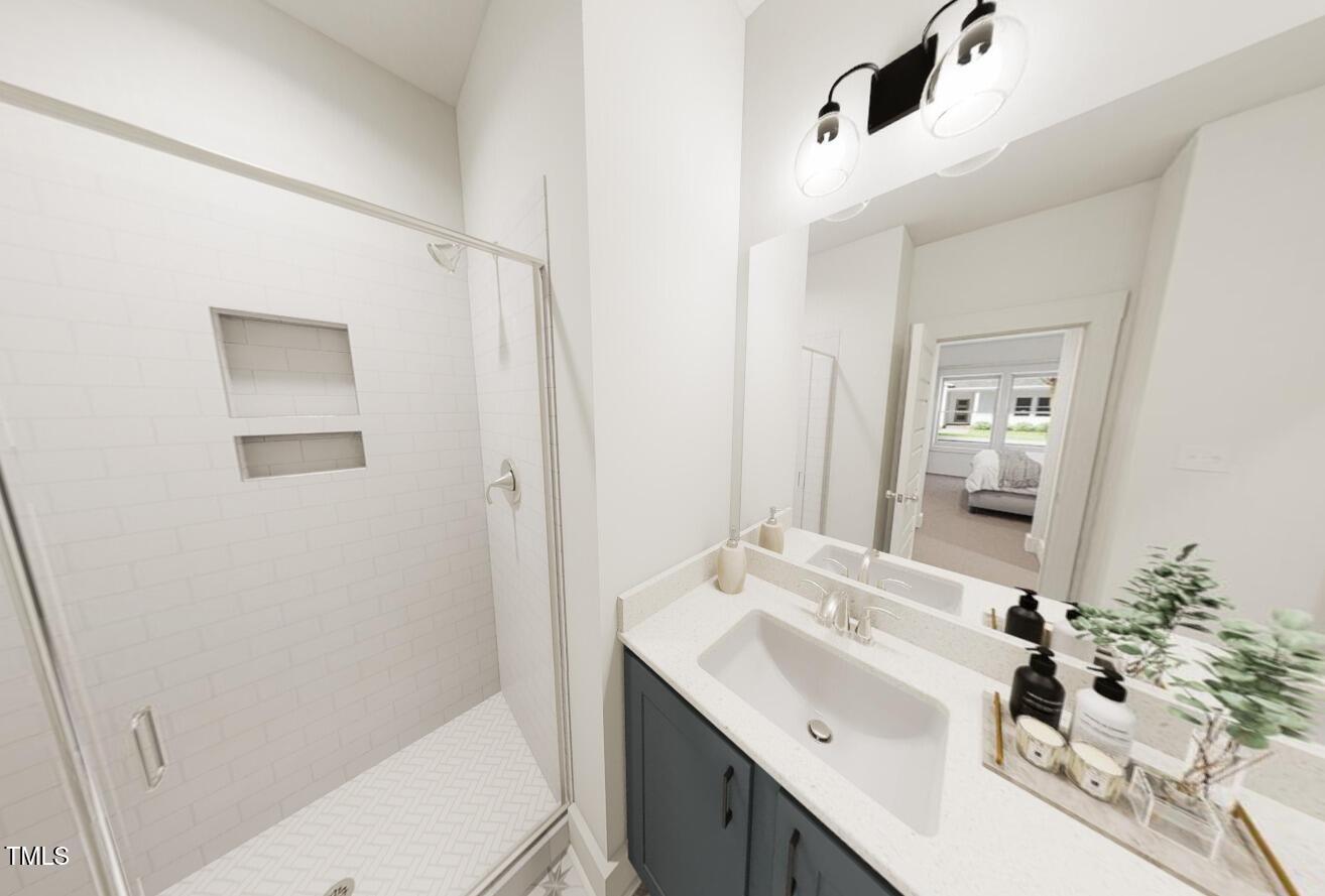 3929 Willow Gate Way Raleigh, NC 27604 - Photo 10 of 11 1st floor primary bathroom with tiled walk-in shower *these are renderings of the I Got Chills floorplan - options can vary with each home