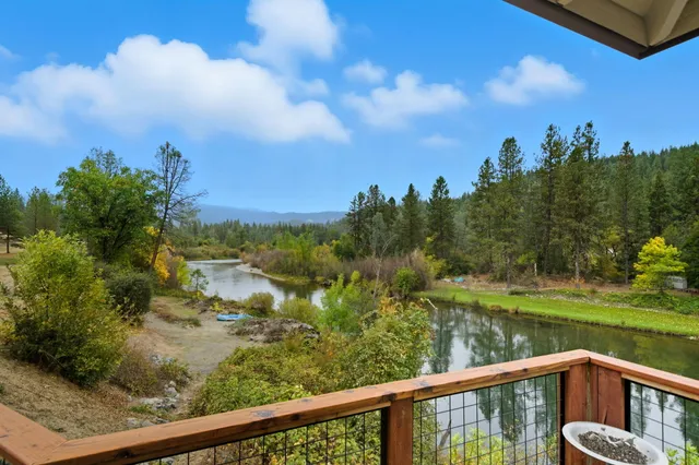 a bedroom with a bed and a table in it