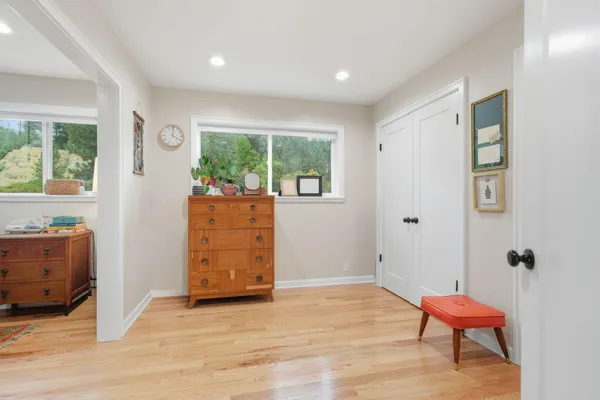 a view of room with furniture and a window
