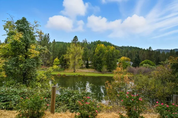 a view of a lake with mountains in the background