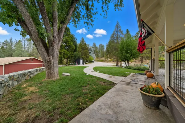 a view of a lake with a yard