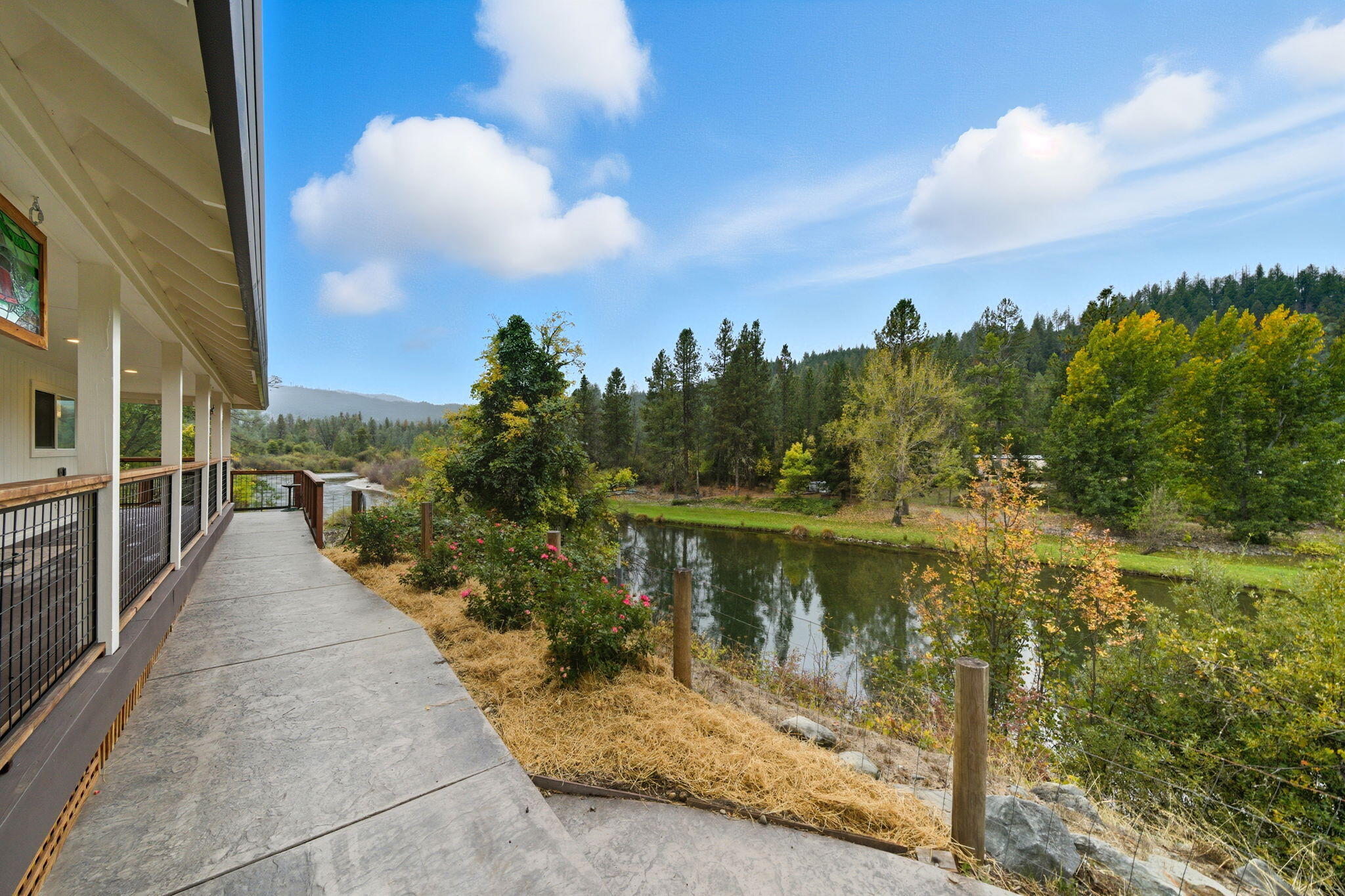 7848 Rush Creek Road Lewiston, CA 96052 - Photo 38 of 44 a view of a lake with a yard