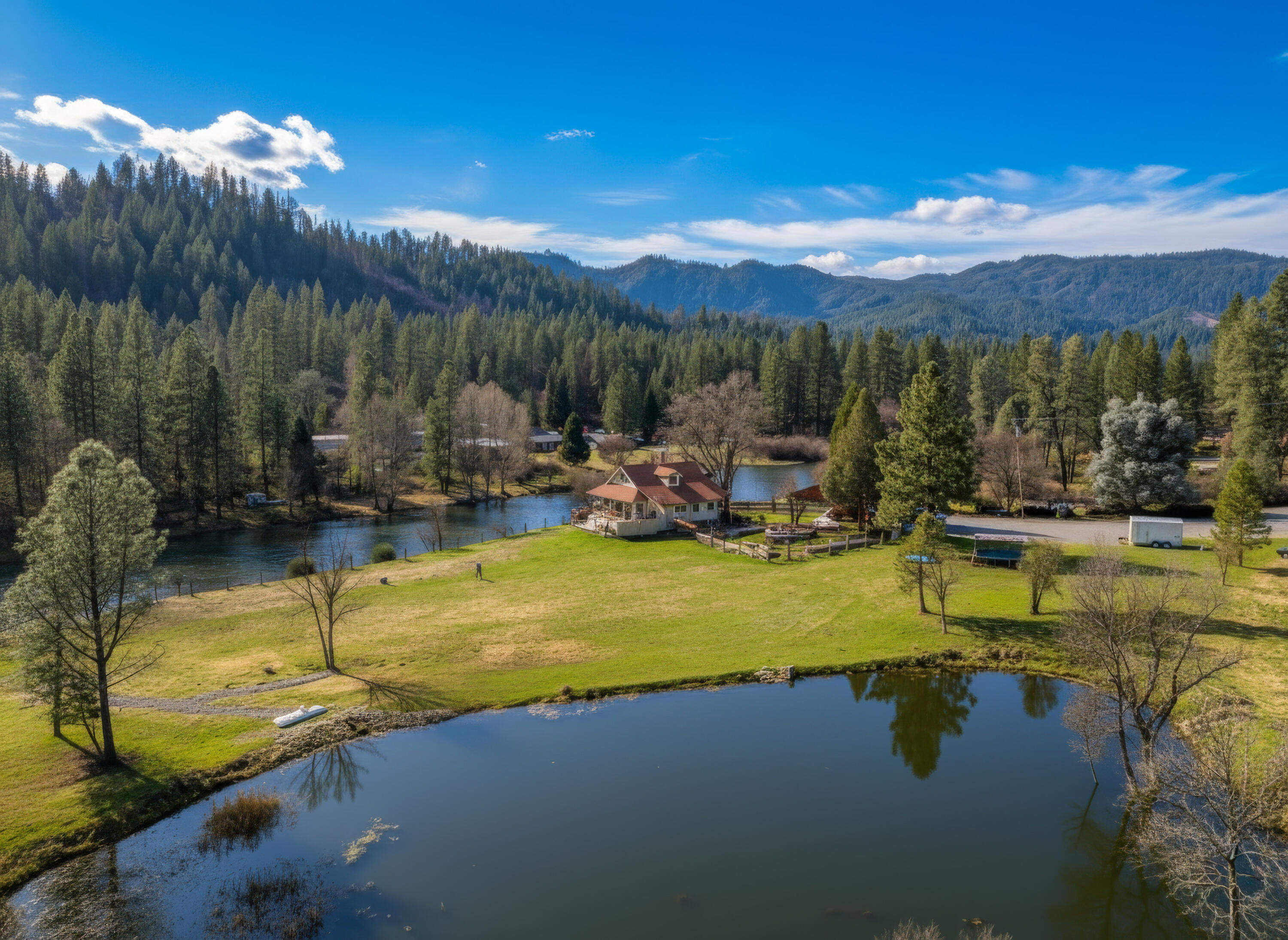 7848 Rush Creek Road Lewiston, CA 96052 - Photo 4 of 44 a view of a lake with a mountain view