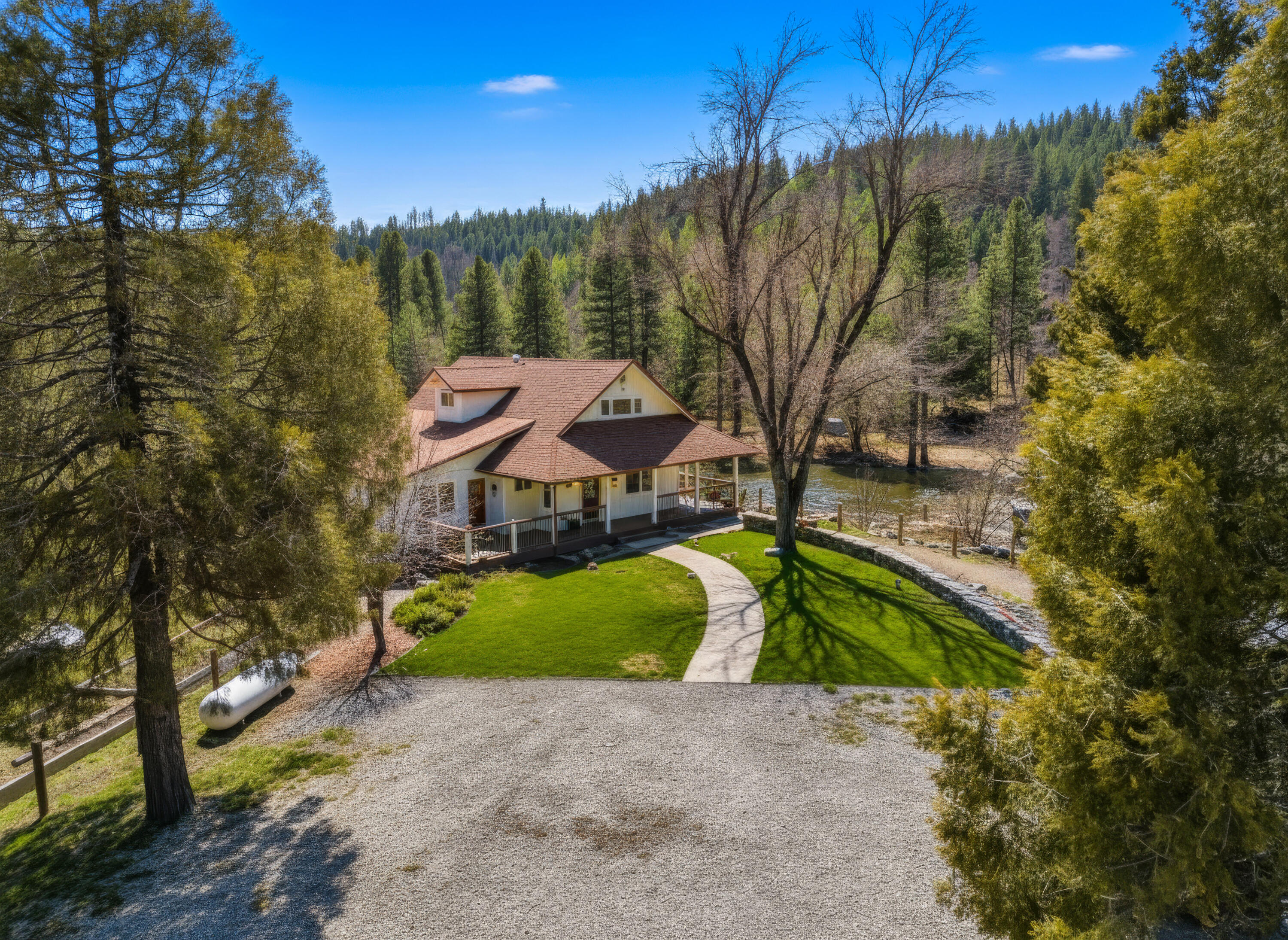 7848 Rush Creek Road Lewiston, CA 96052 - Photo 5 of 44 a view of a house with a yard