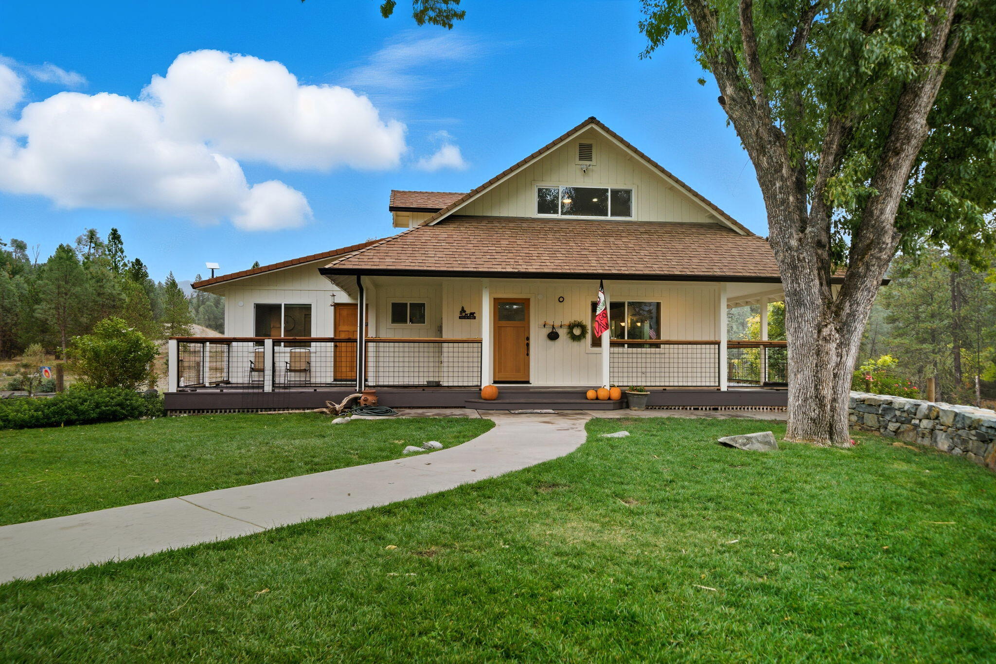 7848 Rush Creek Road Lewiston, CA 96052 - Photo 9 of 44 a view of a house with a yard and porch