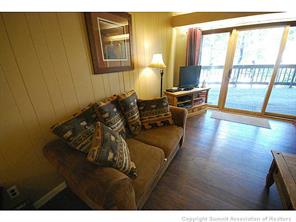 1513 East Keystone Road, Unit 2964 Keystone, CO 80435 - Photo 13 of 17 a living room with furniture and a large window