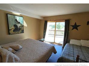 1513 East Keystone Road, Unit 2964 Keystone, CO 80435 - Photo 3 of 17 a bedroom with a bed and a large window