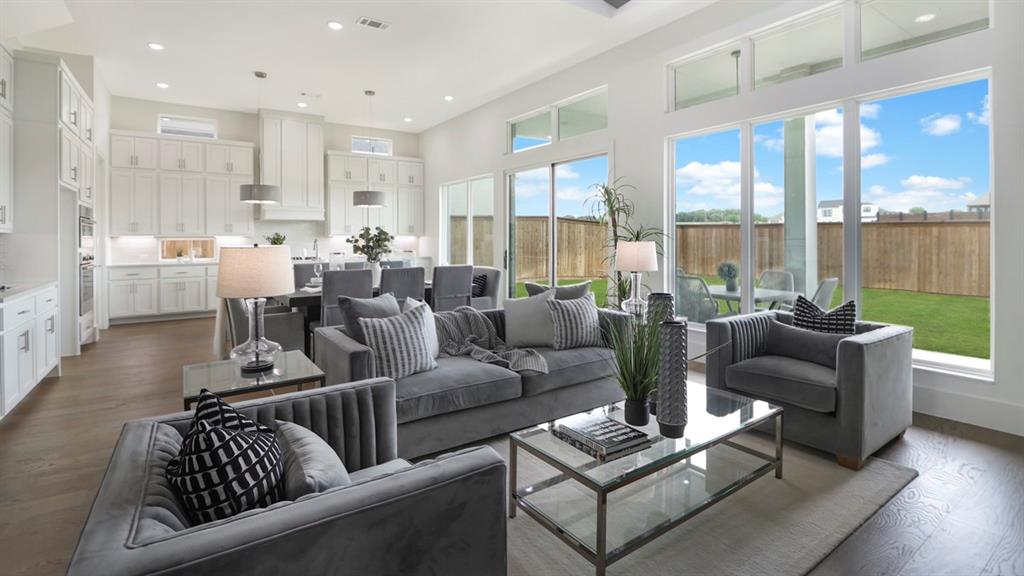 165 Lantern Ridge Drive Aledo, TX 76008 - Photo 24 of 38 a living room with furniture and a large window