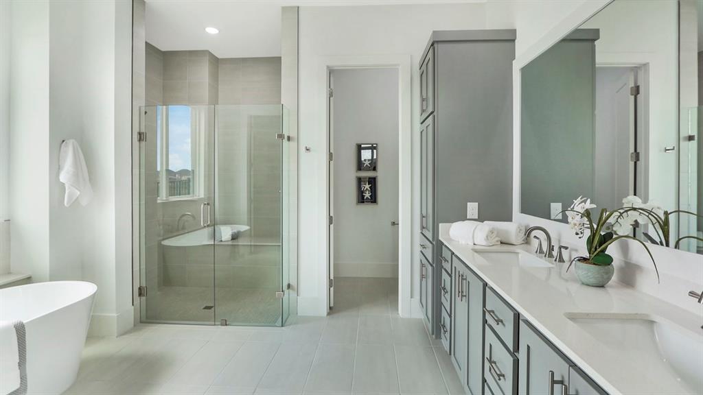 165 Lantern Ridge Drive Aledo, TX 76008 - Photo 29 of 38 a bathroom with a double vanity sink mirror and shower