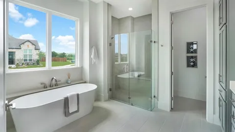 a bathroom with a double vanity sink a mirror and a shower