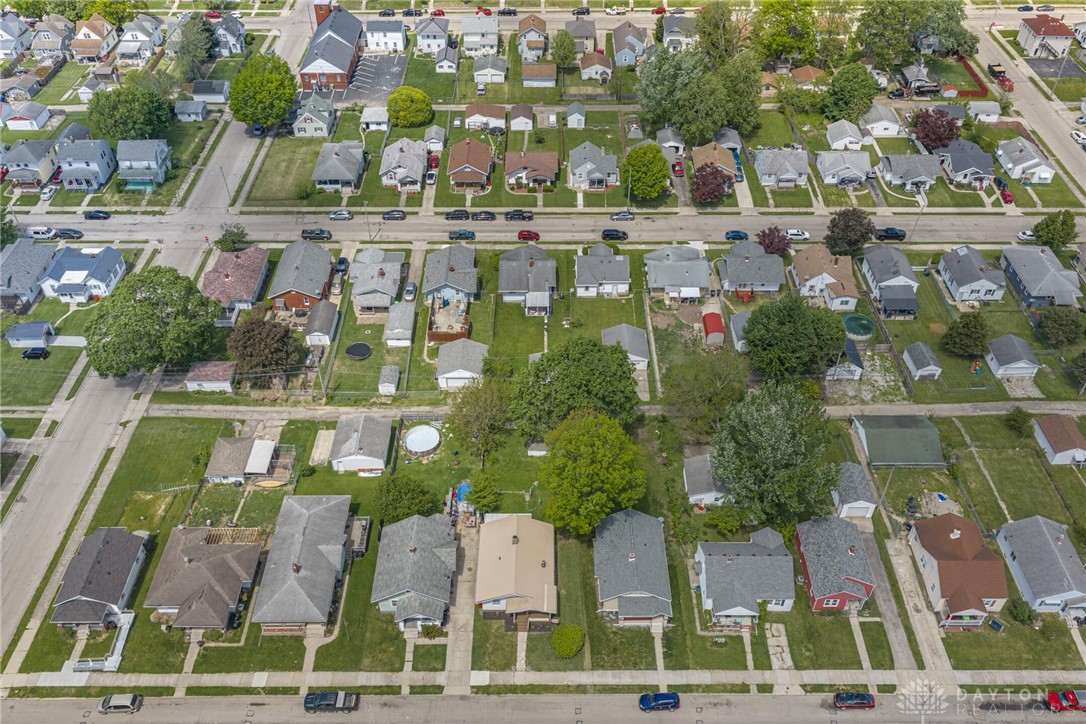 2118 Hillside Avenue Springfield, OH 45503 - Photo 22 of 28 An aerial perspective showcases a vibrant neighborhood with diverse homes and lush green spaces.