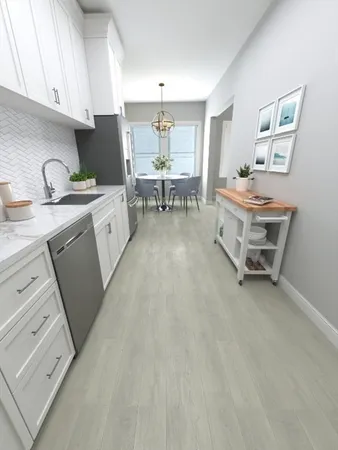 a living room with furniture and a dining table with wooden floor