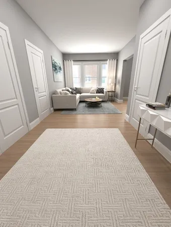 a large white bed in a large room with a large window