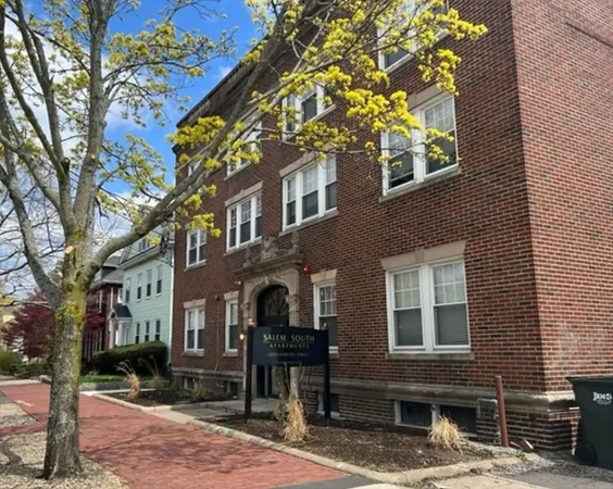 a front view of a building with street view