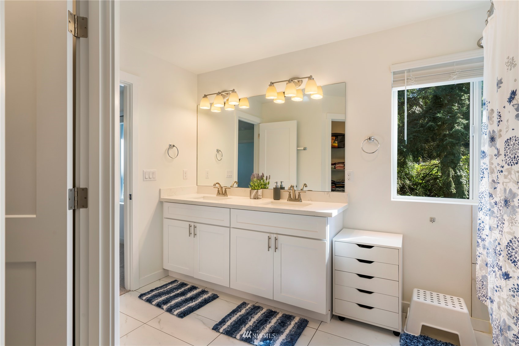 19512 Damson Road, Unit A Lynnwood, WA 98036 - Photo 23 of 37 a bathroom with a double vanity sink mirror and