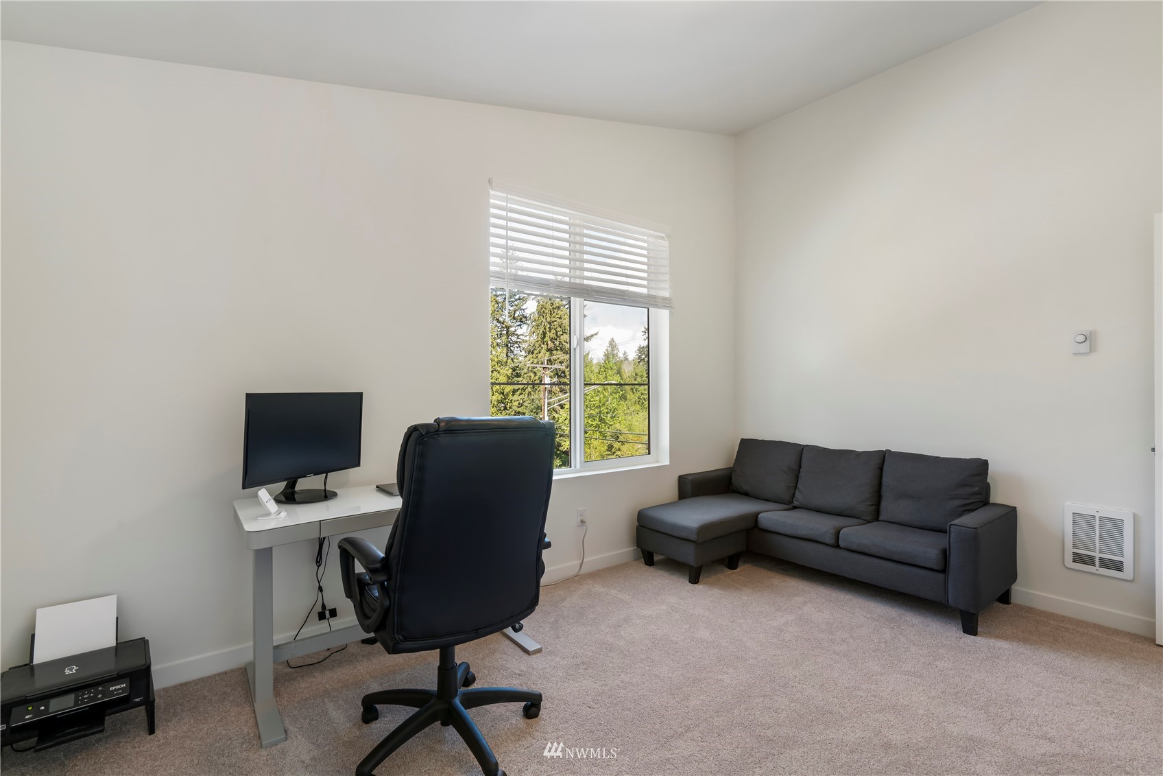 19512 Damson Road, Unit A Lynnwood, WA 98036 - Photo 31 of 37 a living room with furniture and a window