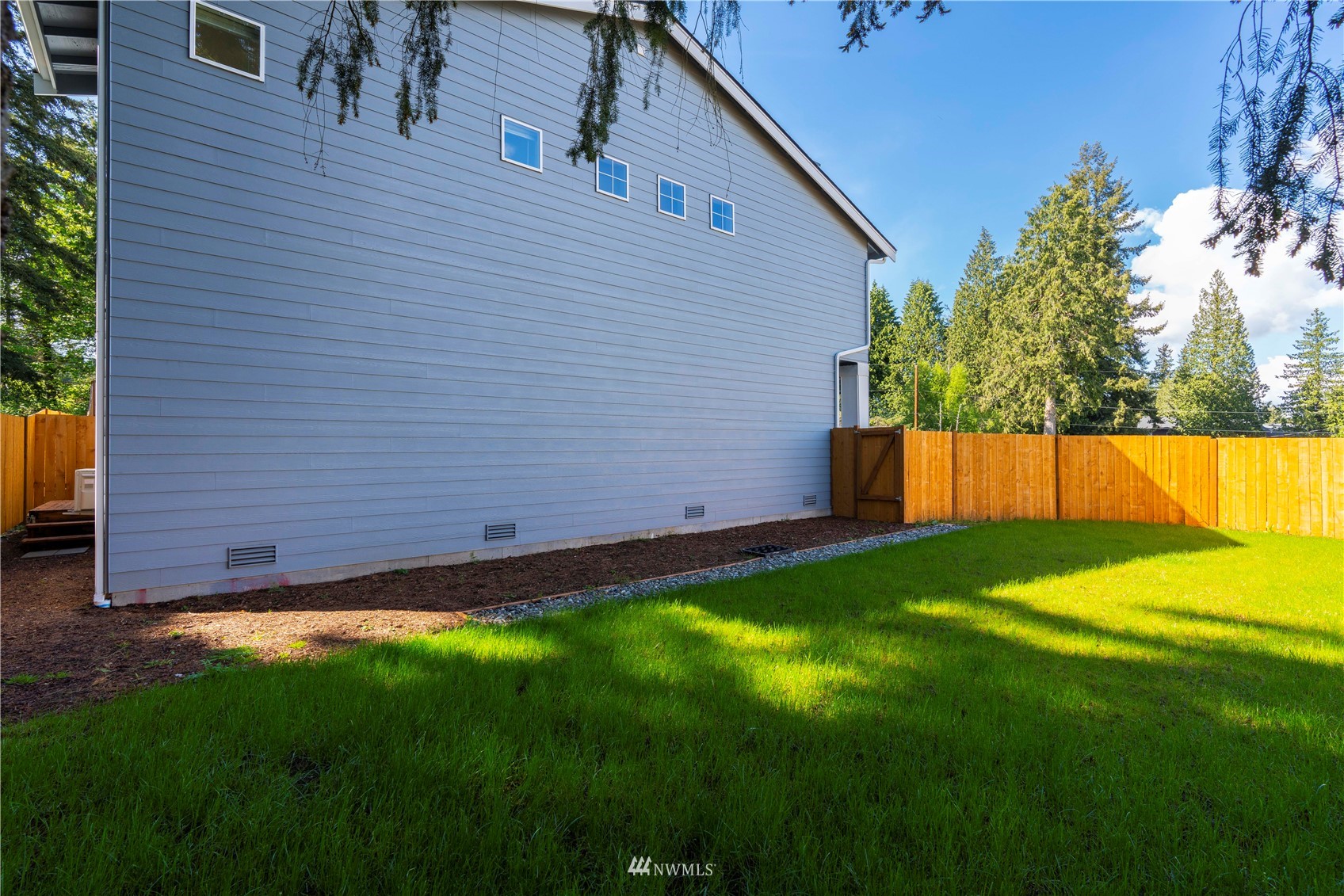 19512 Damson Road, Unit A Lynnwood, WA 98036 - Photo 36 of 37 a view of yard with small space and garden