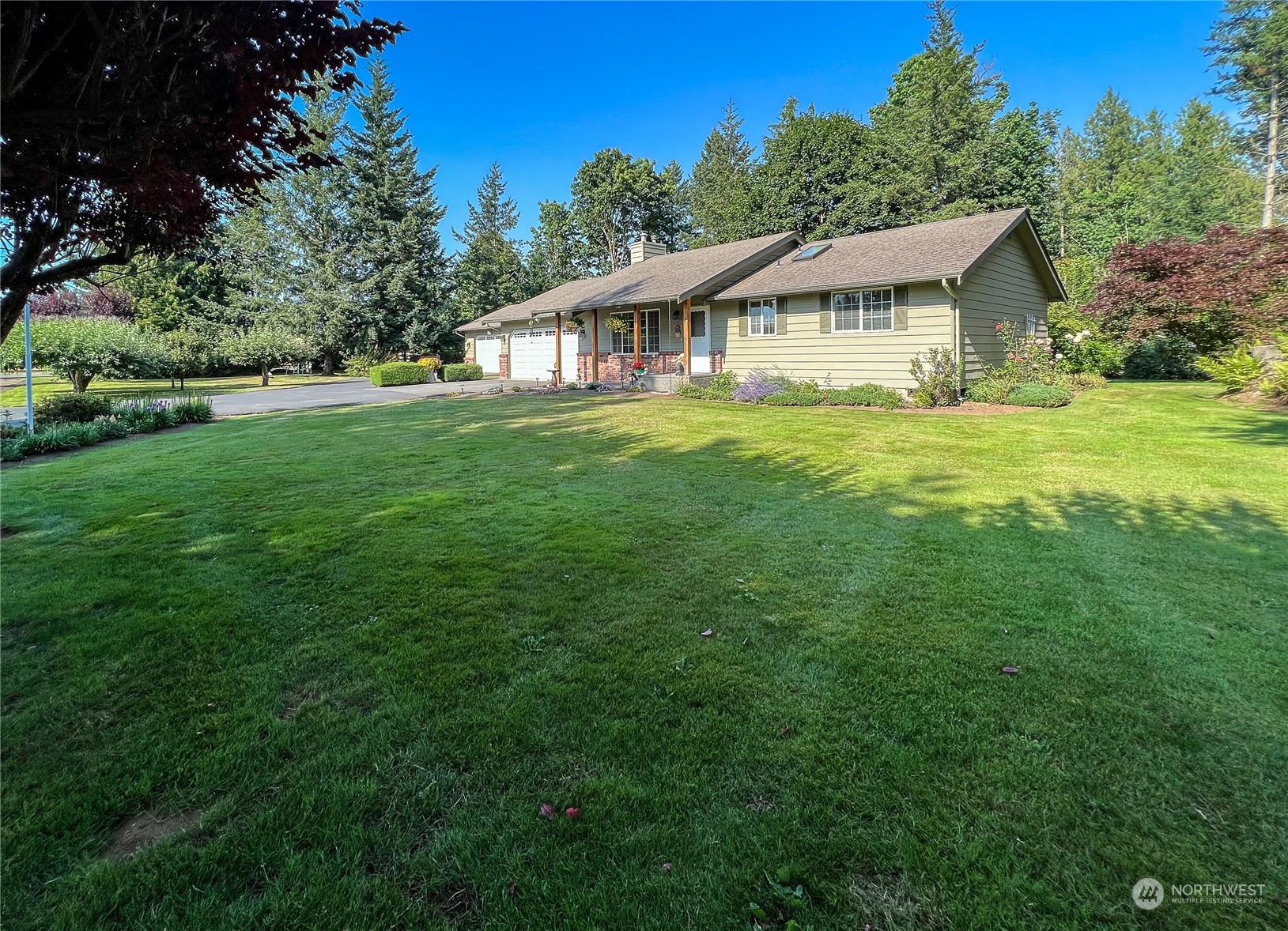 247 West Bartlett Road Lynden, WA 98264 - Photo 4 of 26 a view of a house with a big yard