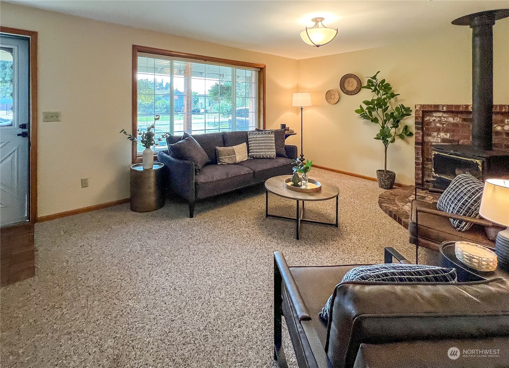 247 West Bartlett Road Lynden, WA 98264 - Photo 5 of 26 a living room with furniture and a large window