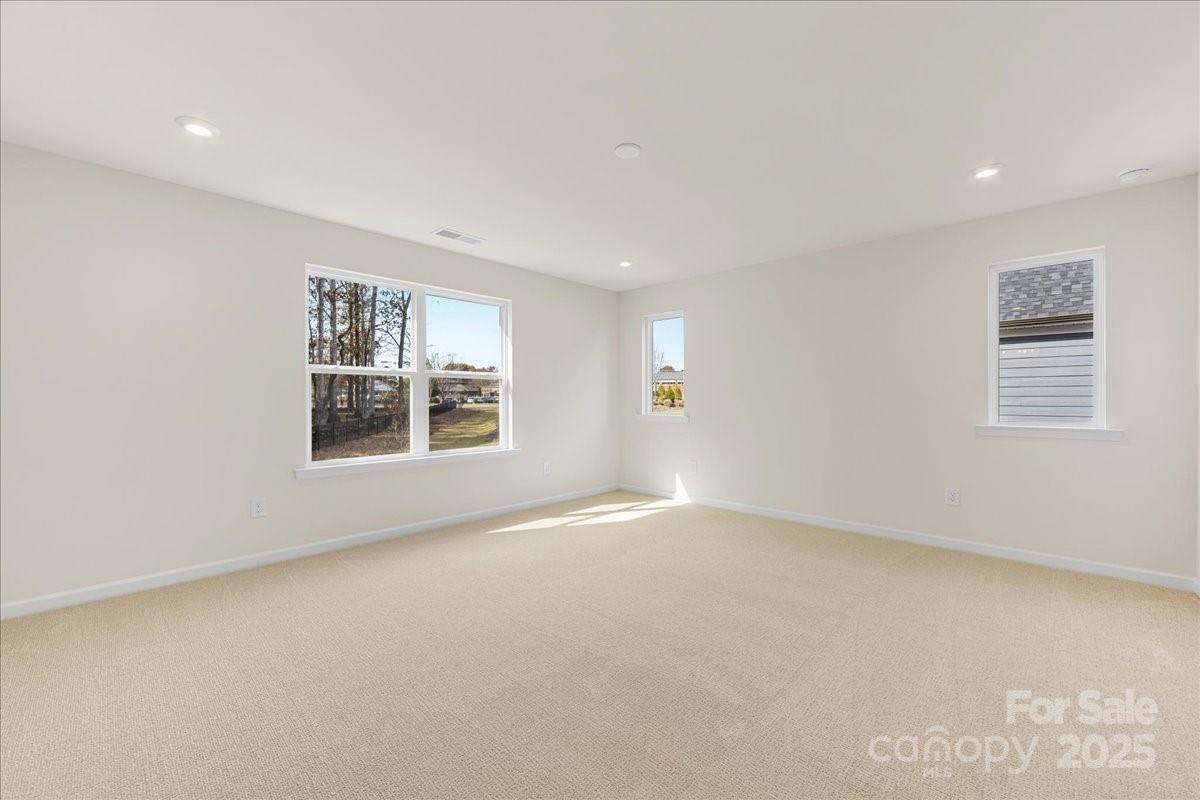 8233 Franklin Trl Street Mint Hill, NC 28227 - Photo 11 of 17 an empty room with windows