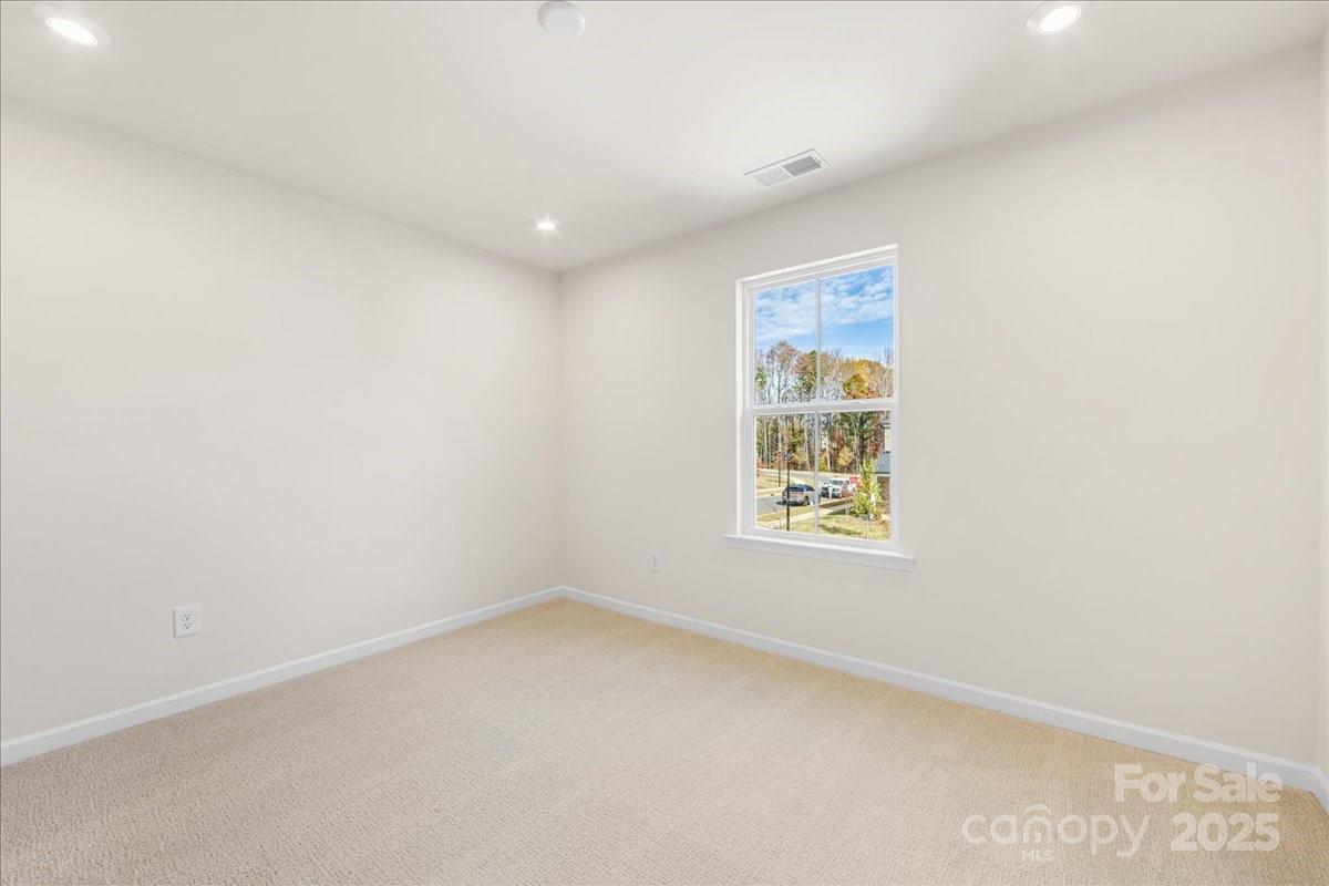 8233 Franklin Trl Street Mint Hill, NC 28227 - Photo 14 of 17 an empty room with a window