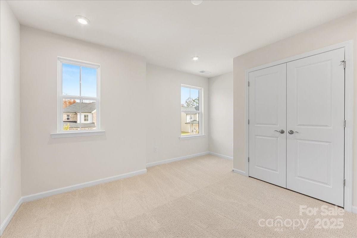 8233 Franklin Trl Street Mint Hill, NC 28227 - Photo 15 of 17 a view of an empty room and a window