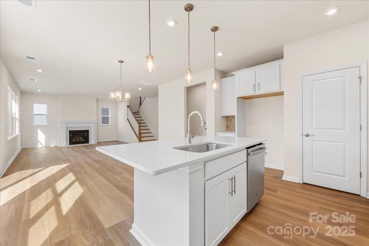 8233 Franklin Trl Street Mint Hill, NC 28227 - Photo 2 of 17 a kitchen with a sink a counter top space and appliances