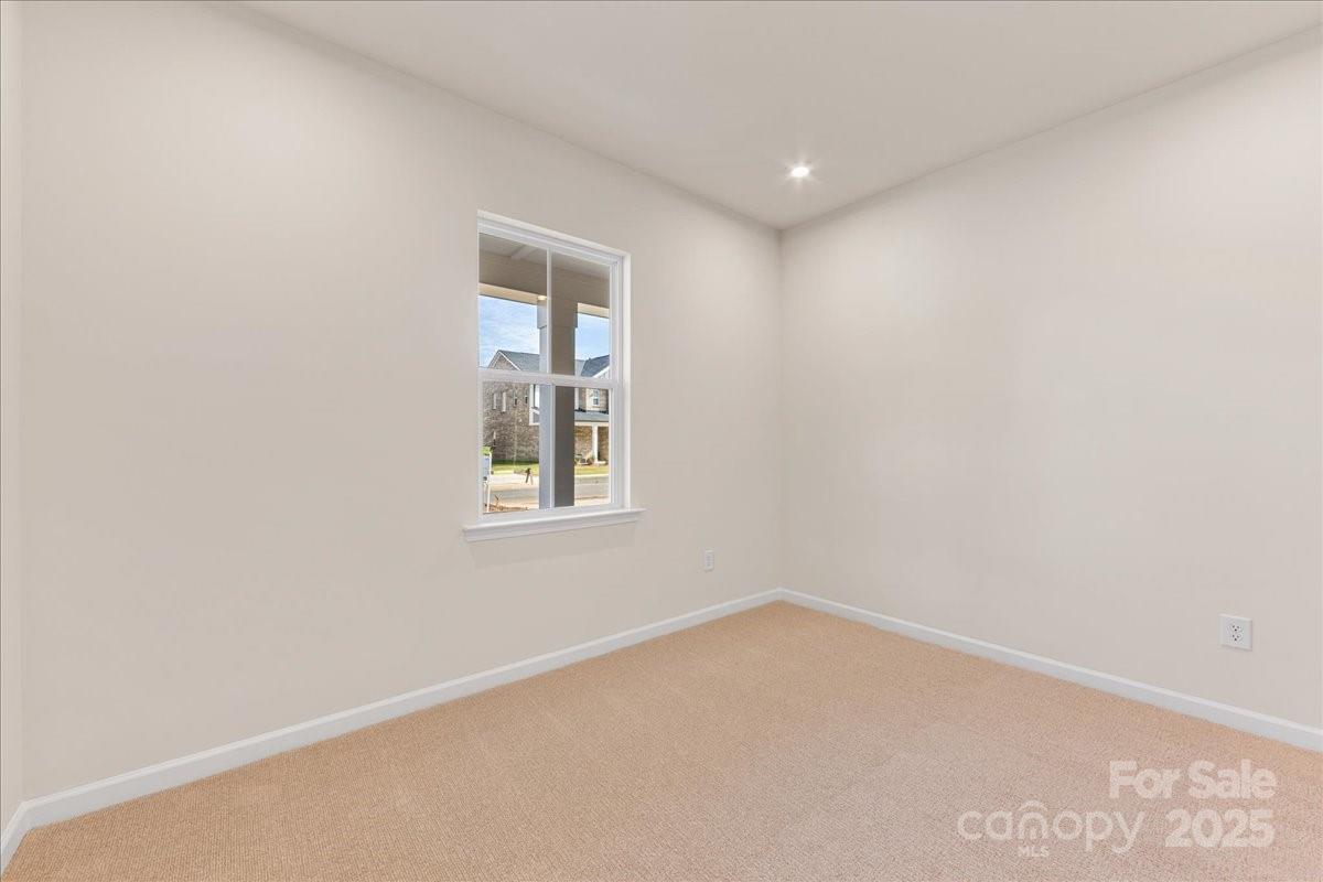 8233 Franklin Trl Street Mint Hill, NC 28227 - Photo 9 of 17 an empty room with a window