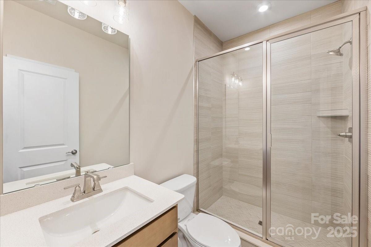 8233 Franklin Trl Street Mint Hill, NC 28227 - Photo 10 of 17 a bathroom with a sink toilet and shower