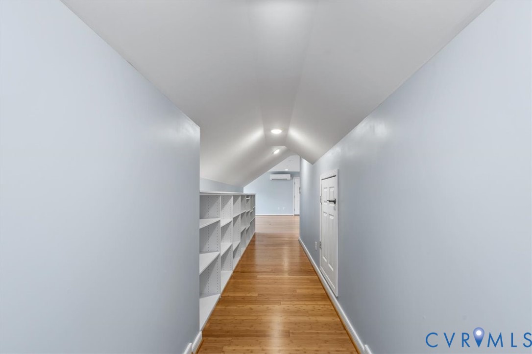 1437 Palmore Road Powhatan, VA 23139 - Photo 41 of 60 Hallway featuring wood-finish flooring and recesse