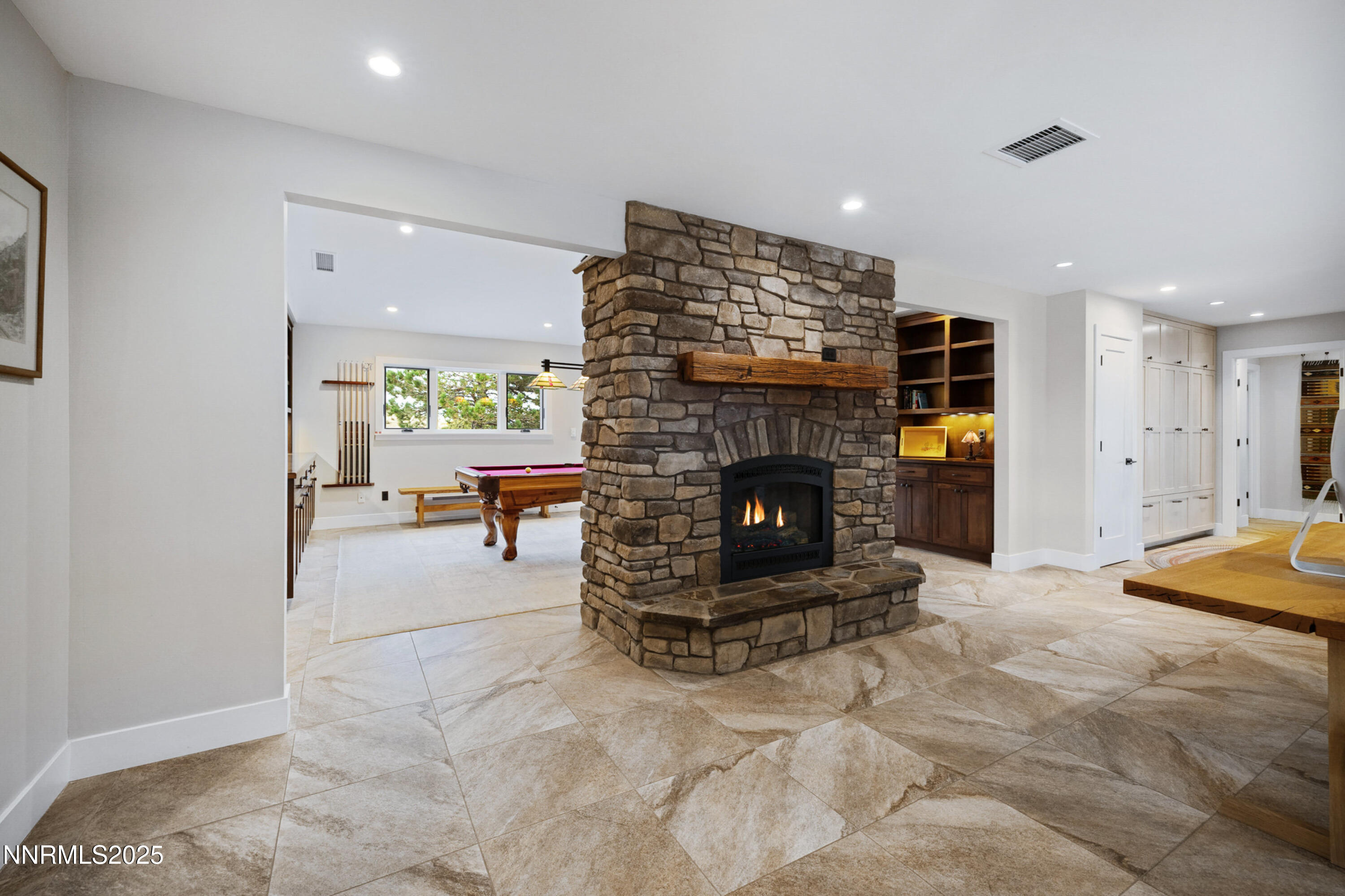 110 Moonstone Lane Reno, NV 89508 - Photo 17 of 68 a living room with furniture and a fireplace