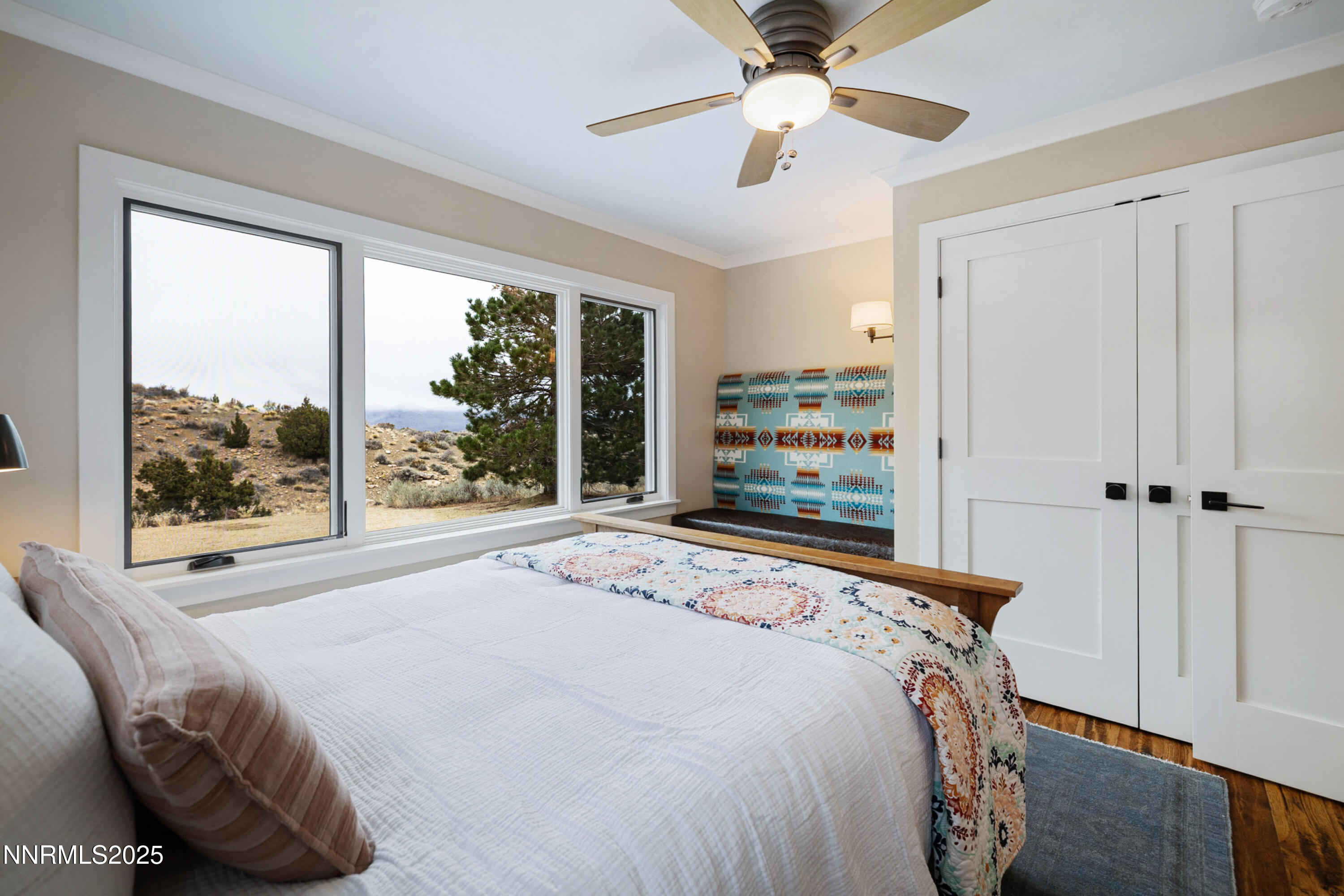 110 Moonstone Lane Reno, NV 89508 - Photo 29 of 68 a bedroom with a bed and a large window with the outer view