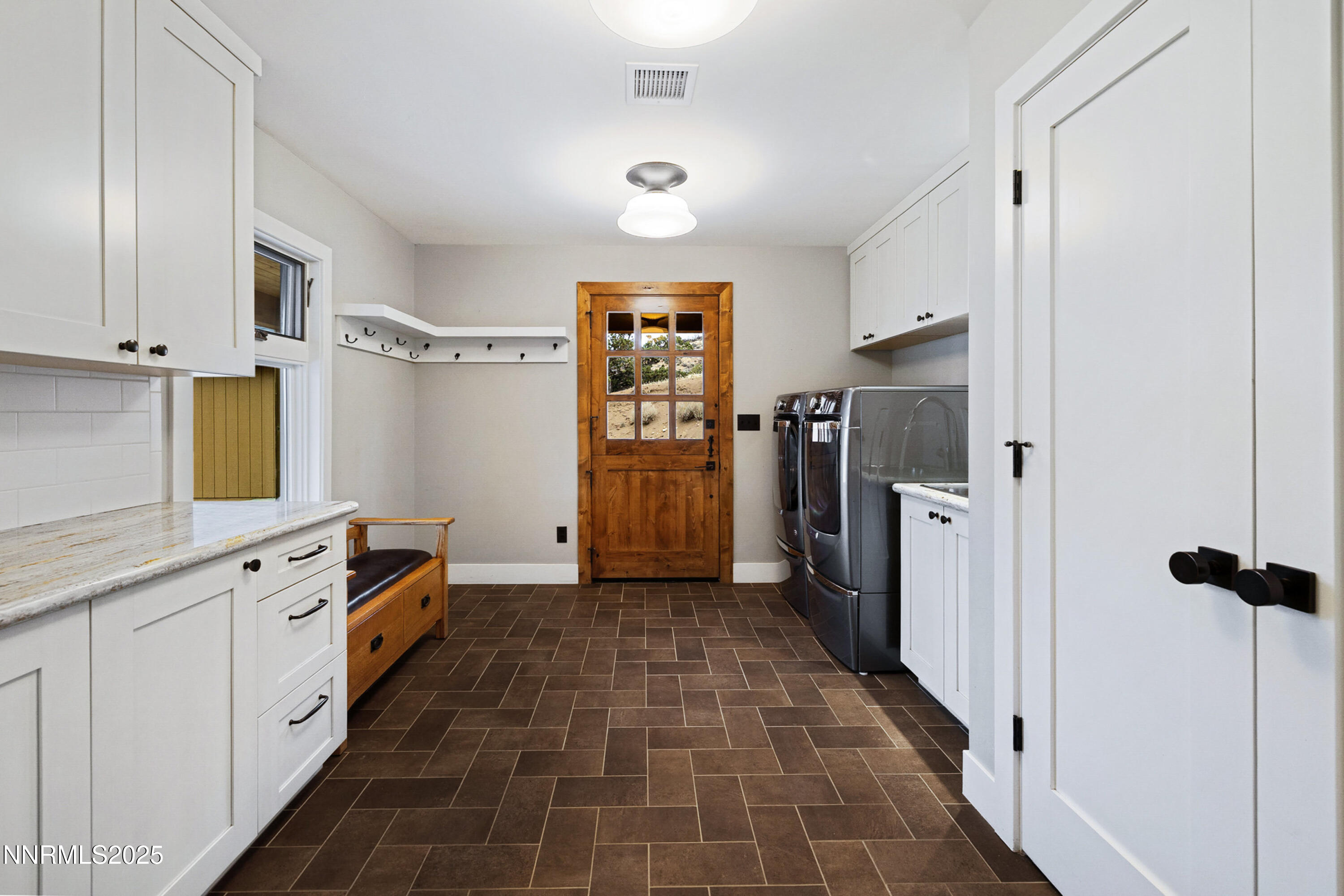 110 Moonstone Lane Reno, NV 89508 - Photo 33 of 68 a kitchen with a refrigerator and a stove