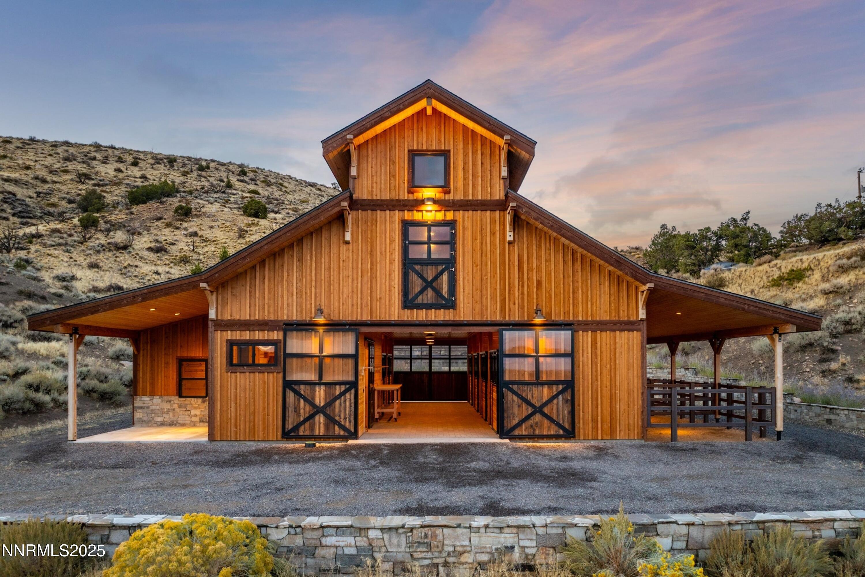110 Moonstone Lane Reno, NV 89508 - Photo 40 of 68 a view of a house with large windows