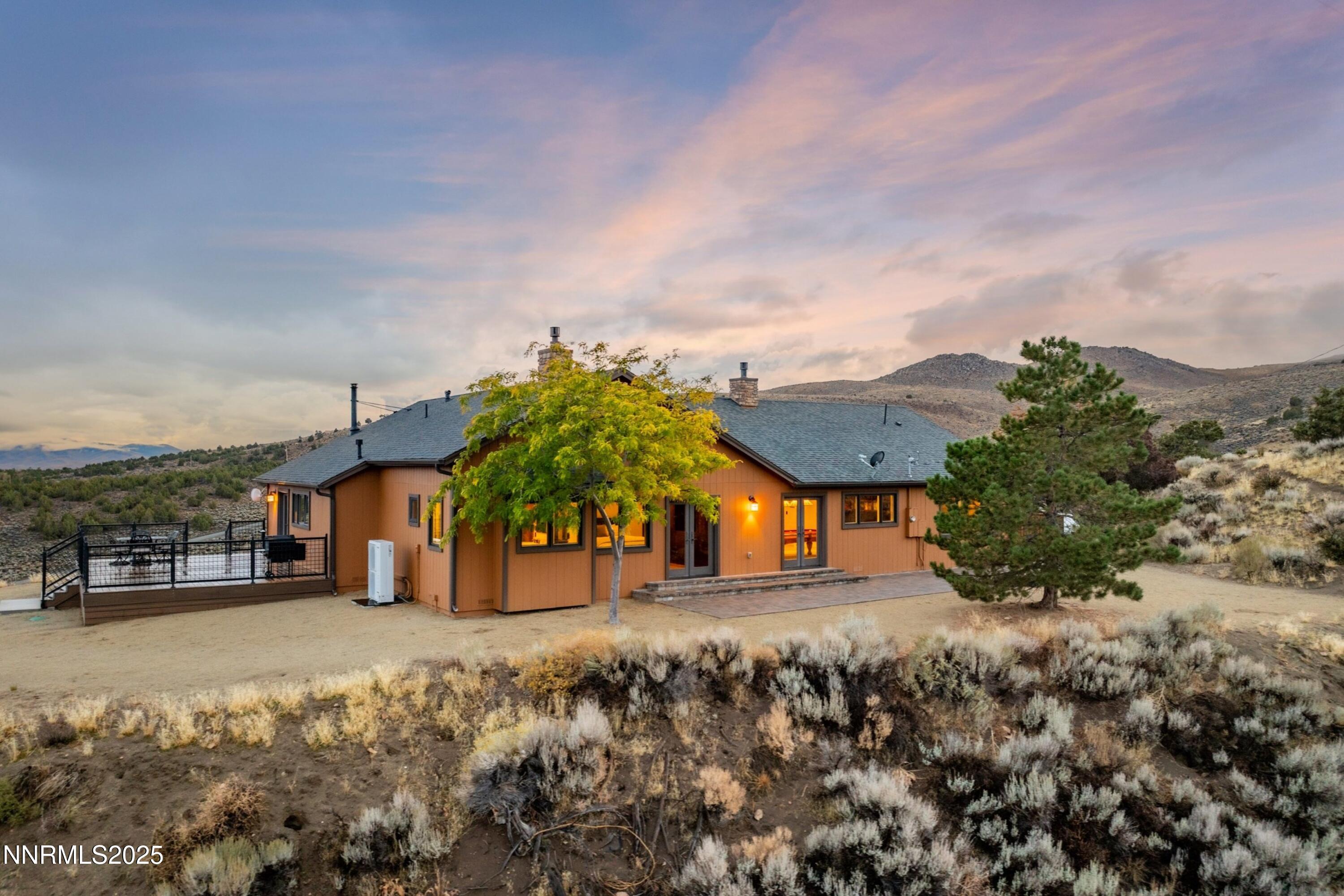 110 Moonstone Lane Reno, NV 89508 - Photo 67 of 68 a view of a house with a yard