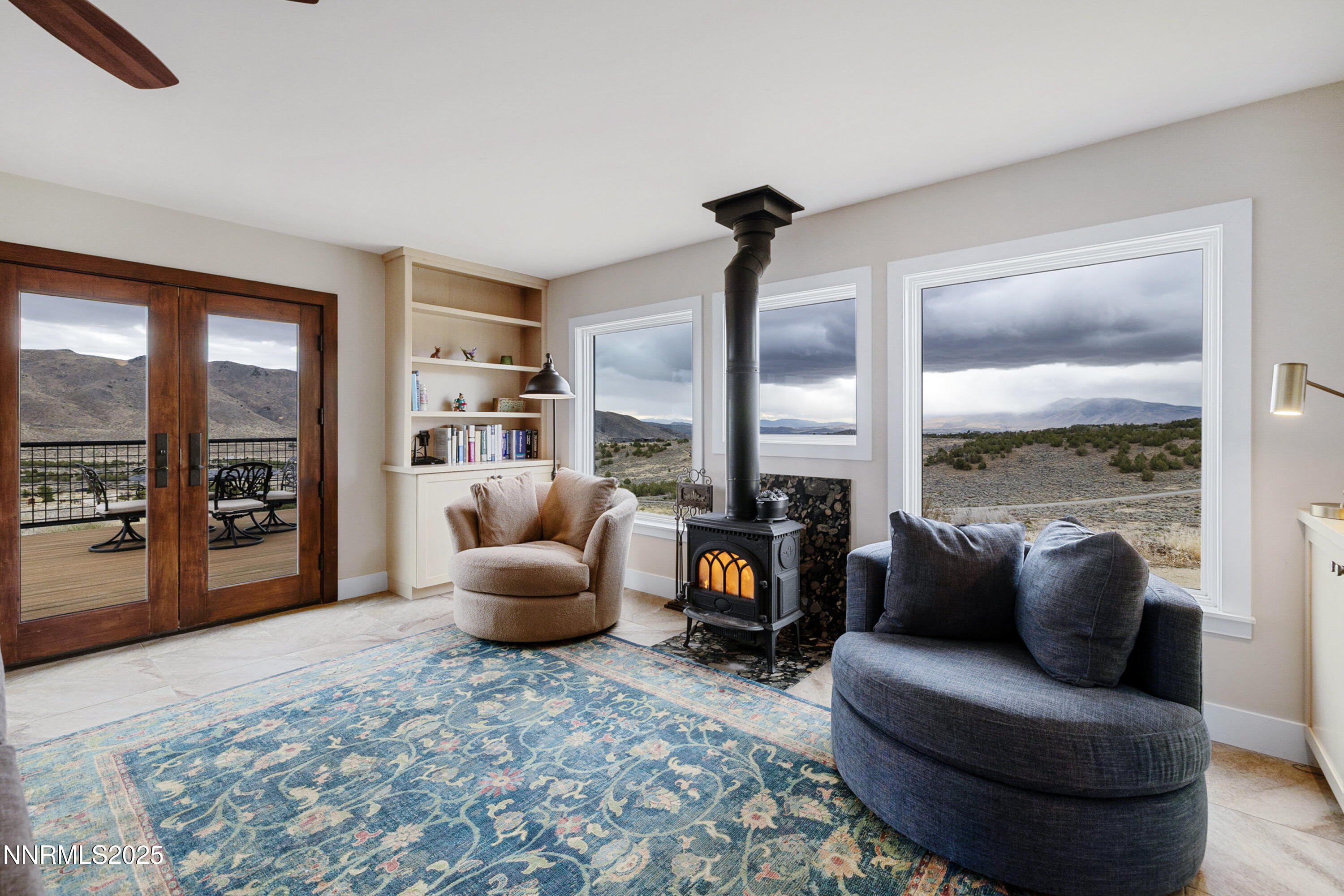 110 Moonstone Lane Reno, NV 89508 - Photo 10 of 68 a living room with furniture and a large window