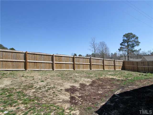 329 Trout Valley Road Wake Forest, NC 27587 - Photo 11 of 15 The back yard is fenced for your pets with lots of space for kids to romp.