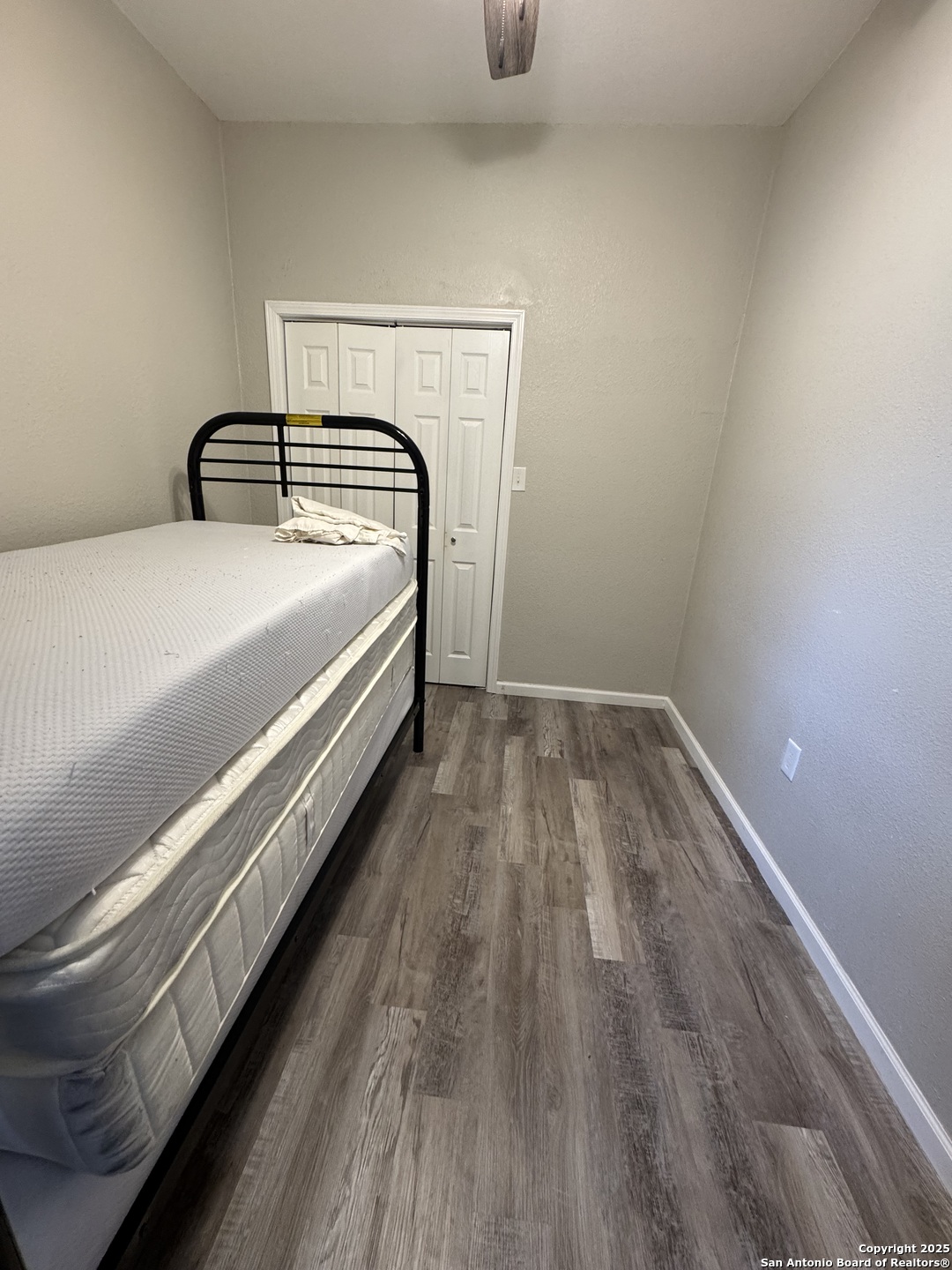 1240 Rice Road San Antonio, TX 78220 - Photo 29 of 45 a bedroom with a bed and window