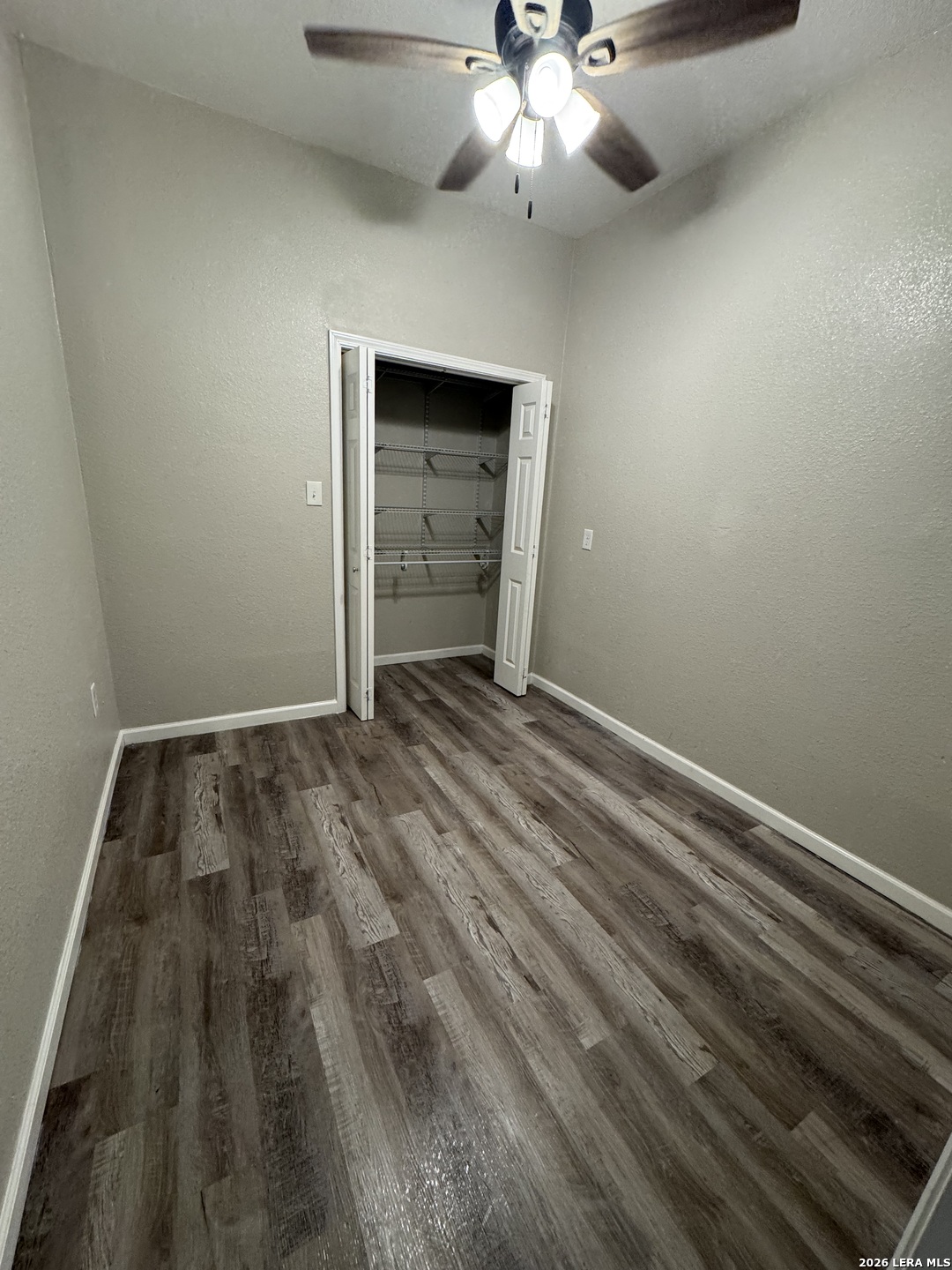 1240 Rice Road San Antonio, TX 78220 - Photo 30 of 45 wooden floor in an empty room