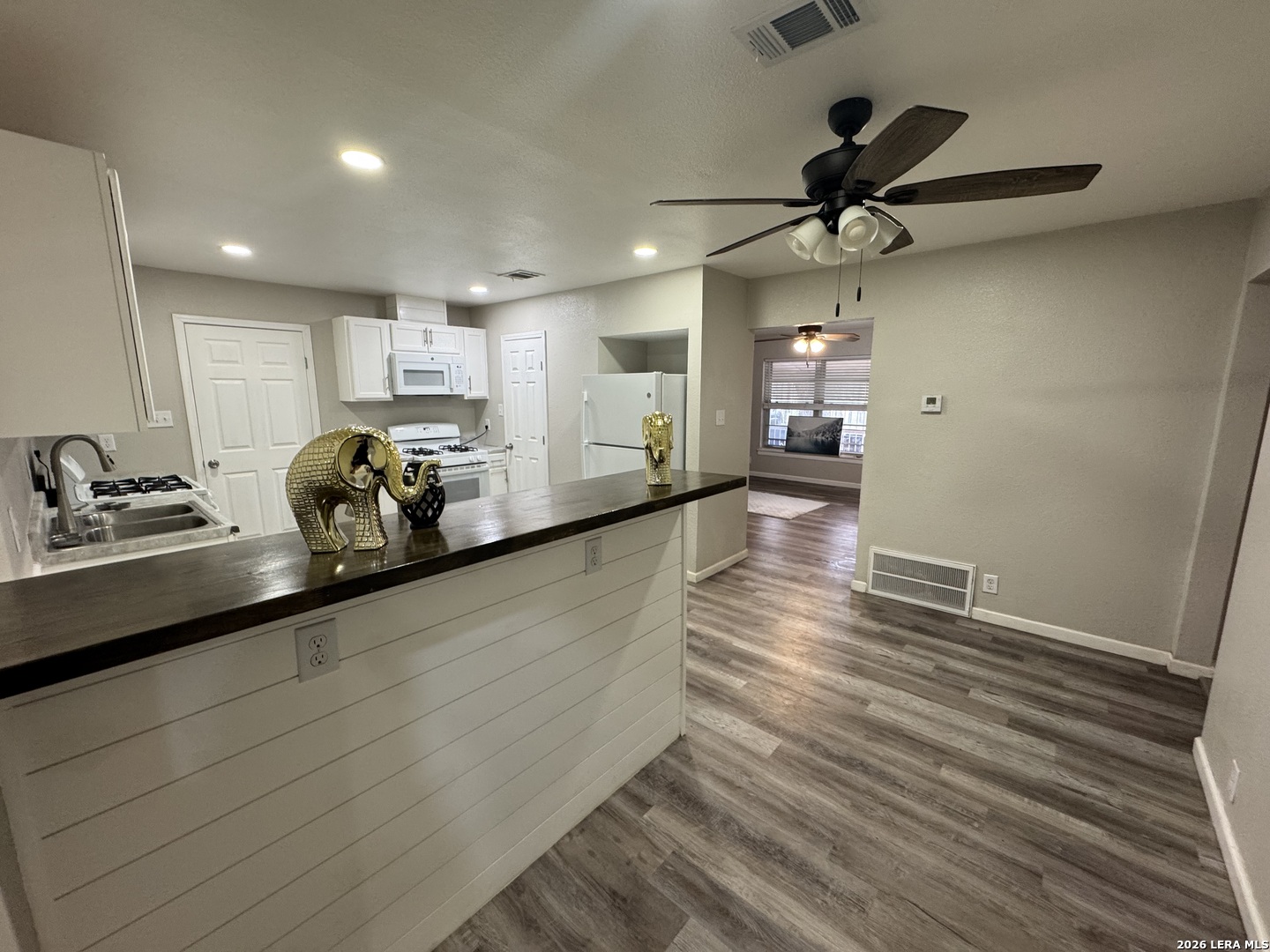 1240 Rice Road San Antonio, TX 78220 - Photo 8 of 45 a very nice looking room with wooden floor