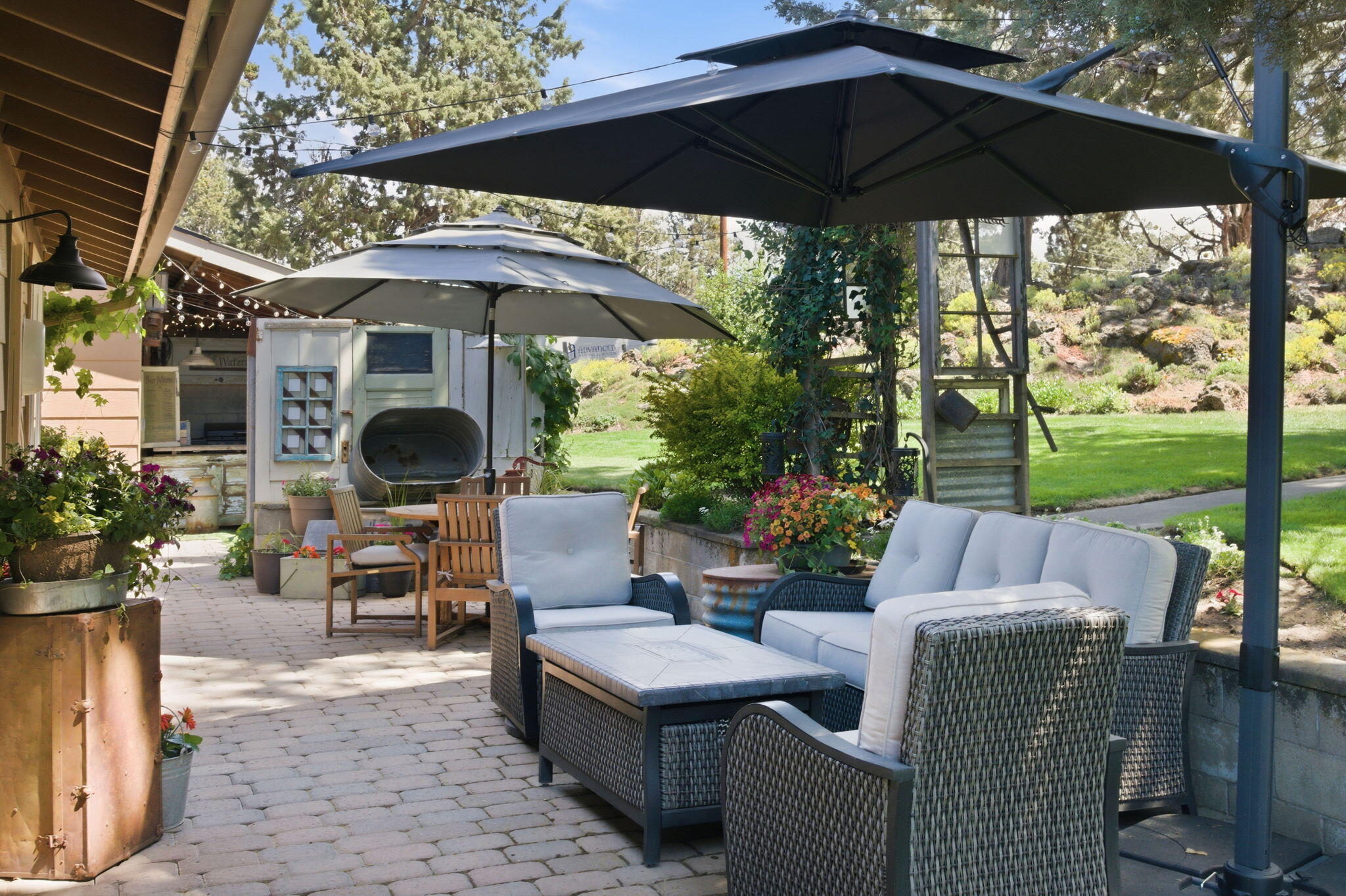 22539 Martee Lane Bend, OR 97701 - Photo 25 of 54 a view of an outdoor sitting area with furniture and garden view